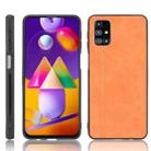 For Samsung Galaxy M31s Shockproof Sewing Cow Pattern Skin PC + PU + TPU Case(Orange) - 1