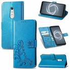 For FUJITSU F-41B Four-leaf Clasp Embossed Buckle Mobile Phone Protection Leather Case with Lanyard & Card Slot & Wallet & Bracket Function(Blue) - 1