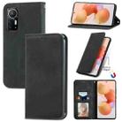 For Xiaomi 12 / 12X Retro Skin Feel Magnetic Flip Leather Phone Case(Black) - 1