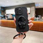 For iPhone 12 Pro Max 3D Astronaut Holder Skin-feel Silicone Phone Case with Wristband(Black) - 1