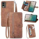 For Nokia C32 Embossed Flower Zipper Leather Phone Case(Brown) - 1