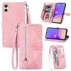 For Samsung Galaxy A05 Embossed Flower Zipper Leather Phone Case(Pink) - 1