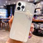 For iPhone 16 Pro Pearl Bow Glitter Epoxy TPU Phone Case(Cross Knots) - 1