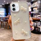 For iPhone 16 Plus Pearl Bow Glitter Epoxy TPU Phone Case(Three Knots) - 1