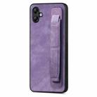 For Samsung Galaxy A04e Retro Wristband Holder Leather Back Phone Case(Purple) - 1
