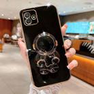 For Samsung Galaxy A04 Embrace Stars Electroplating Astronaut Holder Phone Case(Black) - 1