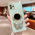 For Samsung Galaxy A04 Embrace Stars Electroplating Astronaut Holder Phone Case(Green) - 1