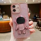 For iPhone 16 Glitter Electroplating Astronaut Holder Phone Case(Pink) - 1