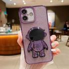 For iPhone 16 Glitter Electroplating Astronaut Holder Phone Case(Purple) - 1