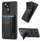 For Xiaomi 12T Pro Carbon Fiber Fold Stand Elastic Card Bag Phone Case(Black) - 1