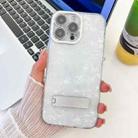 For iPhone 16 Pro Plating Glitter Texture Fold Holder TPU Phone Case with Lens Film(White Shell Pattern) - 1