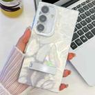 For Samsung Galaxy S25+ 5G Plating Glitter Texture Fold Holder TPU Phone Case with Lens Film(White Feathers) - 1