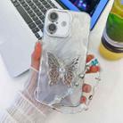 For iPhone 16 Plus Plating Glitter Lens Film Texture Butterfly Holder Wristband Phone Case(White Feather Yarn) - 1