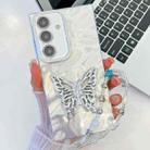 For Samsung Galaxy S24 FE 5G Plating Glitter Lens Film Texture Butterfly Holder Wristband Phone Case(White Feathers) - 1