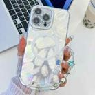 For iPhone 16 Pro Max Plating Texture Wristband MagSafe TPU Phone Case with Glitter Lens Film(White Feathers) - 1