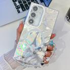 For Samsung Galaxy S24+ 5G Plating Texture Wristband MagSafe TPU Phone Case with Glitter Lens Film(White Feathers) - 1