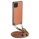 For Samsung Galaxy A12 Carbon Fiber Texture Leather Back Cover Phone Case with Crossbody Strap(Brown) - 1
