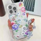 For iPhone 16 Pro Max Electroplating Flowers Plants Texture Wristband TPU Phone Case(Peony FL14) - 1