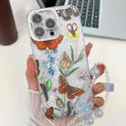 For iPhone 16 Pro Max Electroplating Flowers Plants Texture Wristband TPU Phone Case(Butterfly Love Flower FL17) - 1