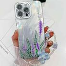 For iPhone 16 Pro Electroplating Flowers Plants Texture Wristband TPU Phone Case(Lavender FL3) - 1