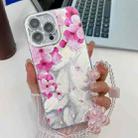 For iPhone 16 Pro Electroplating Flowers Plants Texture Wristband TPU Phone Case(Peach Blossom FL18) - 1