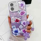 For iPhone 16 Plus Electroplating Flowers Plants Texture Wristband TPU Phone Case(Purple Flowers FL1) - 1