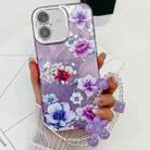 For iPhone 16 Electroplating Flowers Plants Texture Wristband TPU Phone Case(Purple Flowers FL1) - 1