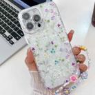 For iPhone 16 Pro Max Electroplating Flower Texture Wristband TPU Phone Case(Wild Chrysanthemum SH5) - 1