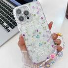 For iPhone 15 Pro Electroplating Flower Texture Wristband TPU Phone Case(Wild Chrysanthemum SH5) - 1
