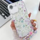 For iPhone 16e Electroplating Flower Texture Wristband TPU Phone Case(Wild Chrysanthemum SH5) - 1