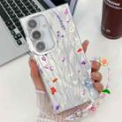 For Samsung Galaxy S24 FE 5G Electroplating Flower Texture Wristband TPU Phone Case(Purple Wildflowers SH1) - 1