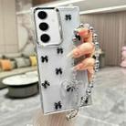 For Samsung Galaxy A35 Little Fresh Bow Bracelet Chain TPU Phone Case(Black) - 1