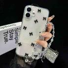 For iPhone 16 Little Fresh Bow Bracelet Chain TPU Phone Case(Black) - 1