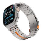 For Apple Watch 42mm / 41mm / 40mm / 38mm Stainless Steel Iron Man Safety Buckle Metal Watch Band(Titanium Color Orange) - 1