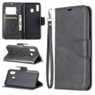 Retro Lambskin Texture Pure Color Horizontal Flip PU Leather Case for Galaxy A20&A30, with Holder & Card Slots & Wallet & Lanyard(Black) - 1