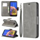 Retro Lambskin Texture Pure Color Horizontal Flip PU Leather Case for Galaxy J4 2018, with Holder & Card Slots & Wallet & Lanyard(Grey) - 1