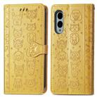 For Fujitsu Arrows We2 / F-52E Cat and Dog Embossed Leather Phone Case(Yellow) - 2
