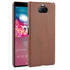 For Sony Xperia 8 Shockproof Crocodile Texture PC + PU Case(Brown) - 1