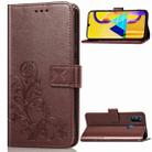 For Galaxy M30   Four-leaf Clasp Embossed Buckle Mobile Phone Protection Leather Case with Lanyard & Card Slot & Wallet & Bracket Function(Brown) - 1