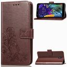 For LG K30 2019   Four-leaf Clasp Embossed Buckle Mobile Phone Protection Leather Case with Lanyard & Card Slot & Wallet & Bracket Function(Brown) - 1