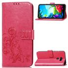 For LG K40S  Four-leaf Clasp Embossed Buckle Mobile Phone Protection Leather Case with Lanyard & Card Slot & Wallet & Bracket Function(Magenta) - 1