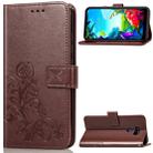 For LG K40S  Four-leaf Clasp Embossed Buckle Mobile Phone Protection Leather Case with Lanyard & Card Slot & Wallet & Bracket Function(Brown) - 1