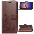 For Motorola E6 Play Four-leaf Clasp Embossed Buckle Mobile Phone Protection Leather Case with Lanyard & Card Slot & Wallet & Bracket Function(Brown) - 1