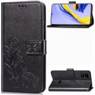 For Galaxy A51 Four-leaf Clasp Embossed Buckle Mobile Phone Protection Leather Case with Lanyard & Card Slot & Wallet & Bracket Function(Black) - 1