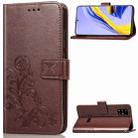 For Galaxy A51 Four-leaf Clasp Embossed Buckle Mobile Phone Protection Leather Case with Lanyard & Card Slot & Wallet & Bracket Function(Brown) - 1