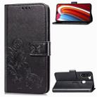 For Galaxy A21 Lucky Clover Pressed Flowers Pattern Leather Case with Holder & Card Slots & Wallet & Hand Strap(Black) - 1