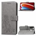 For Galaxy A21 Lucky Clover Pressed Flowers Pattern Leather Case with Holder & Card Slots & Wallet & Hand Strap(Gray) - 1