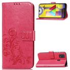 For Galaxy M31 Four-leaf Clasp Embossed Buckle Mobile Phone Protection Leather Case with Lanyard & Card Slot & Wallet & Bracket Function(Magenta) - 1