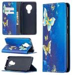 For Nokia 5.3 Colored Drawing Pattern Invisible Magnetic Horizontal Flip PU Leather Case with Holder & Card Slots & Wallet(Gold Butterflies)