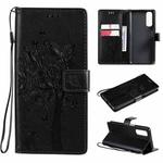 For OPPO Realme 7 Tree & Cat Pattern Pressed Printing Horizontal Flip PU Leather Case with Holder & Card Slots & Wallet & Lanyard(Black)